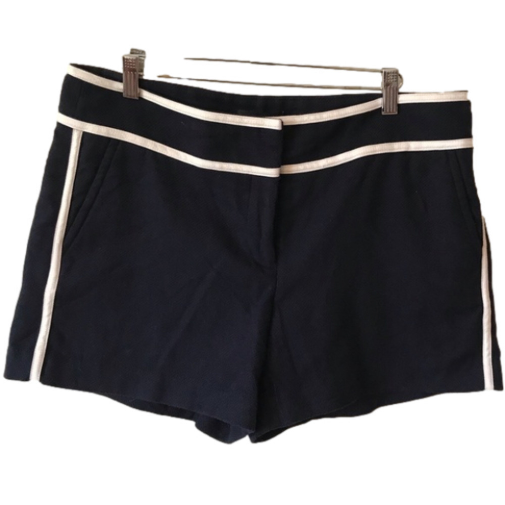 Ann Taylor navy blue shorts with white trim/ piping.